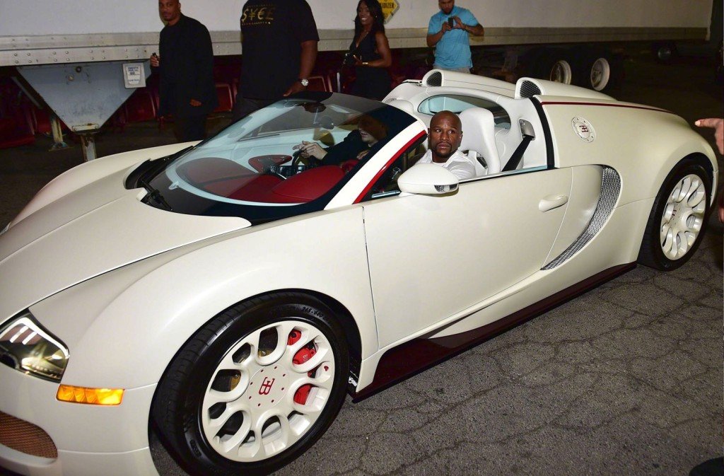 Floyd Mayweather in a white Bugatti Veyron